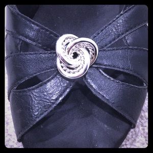 Silver knot clip on earrings